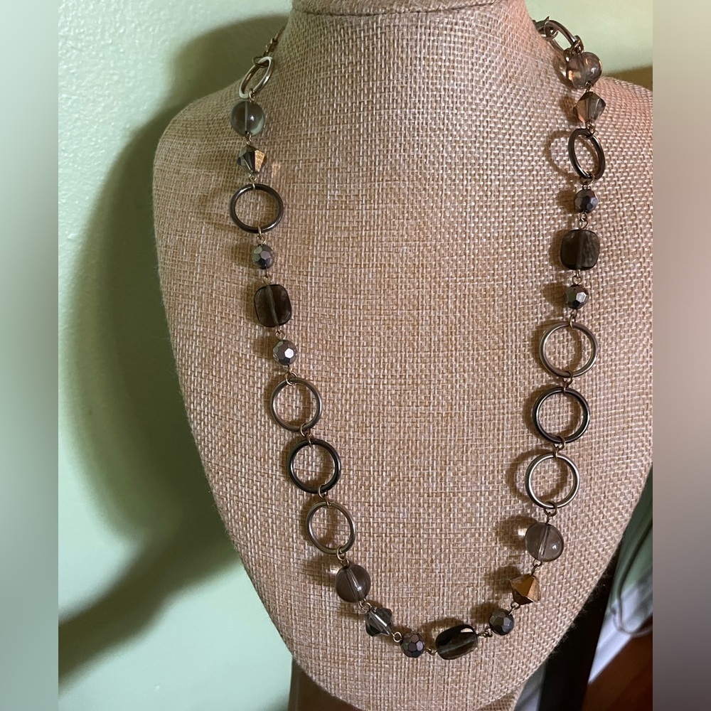 Silver hoop necklace with smoky gray and topaz coloured beads
